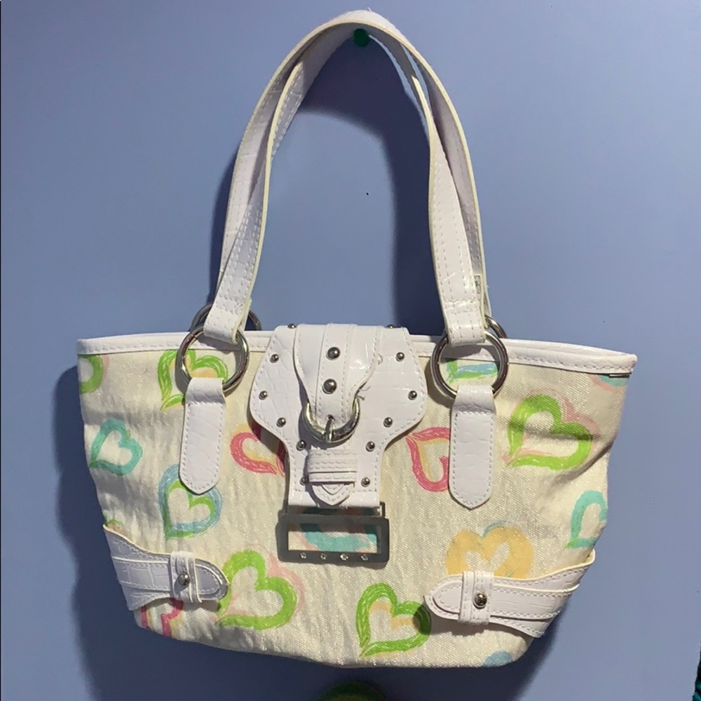 White purse with colorful hearts